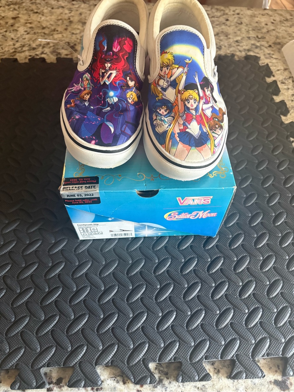 Vans Women Sailor Moon Slip-On Sneakers in White and Blue with Multicolor design